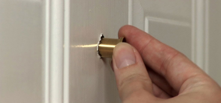 peephole door repair in Escalon